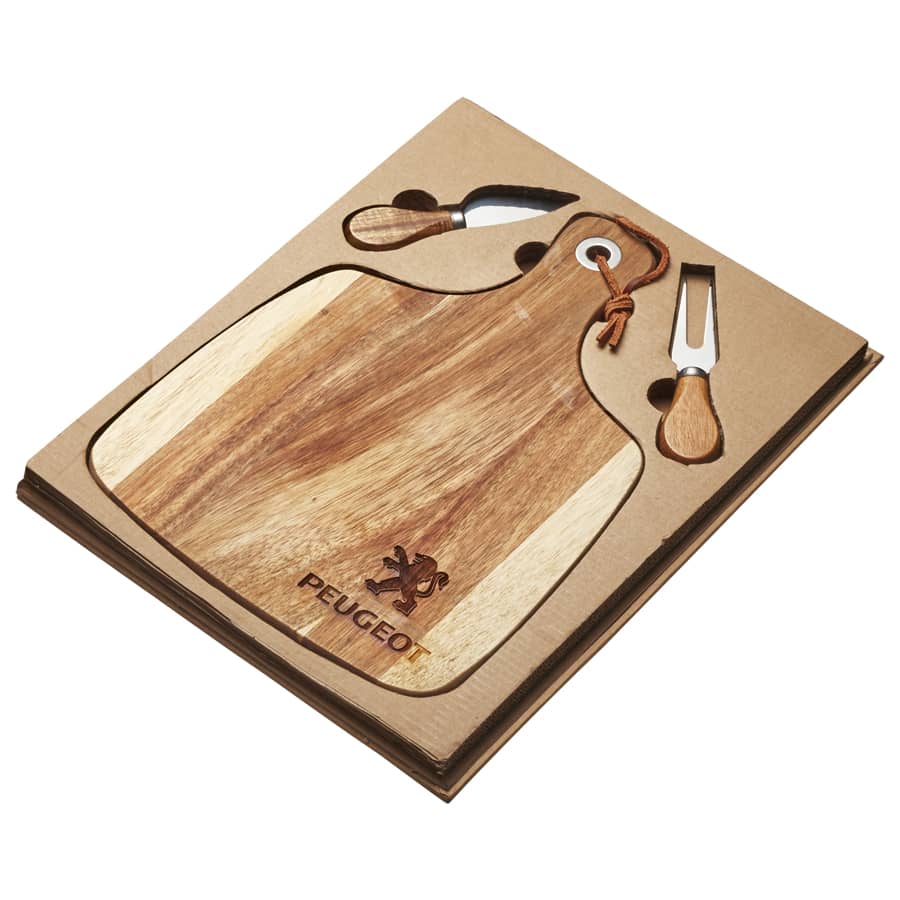 Acacia cheeseboard with a knife and fork set, featuring natural wood tones and a logo.