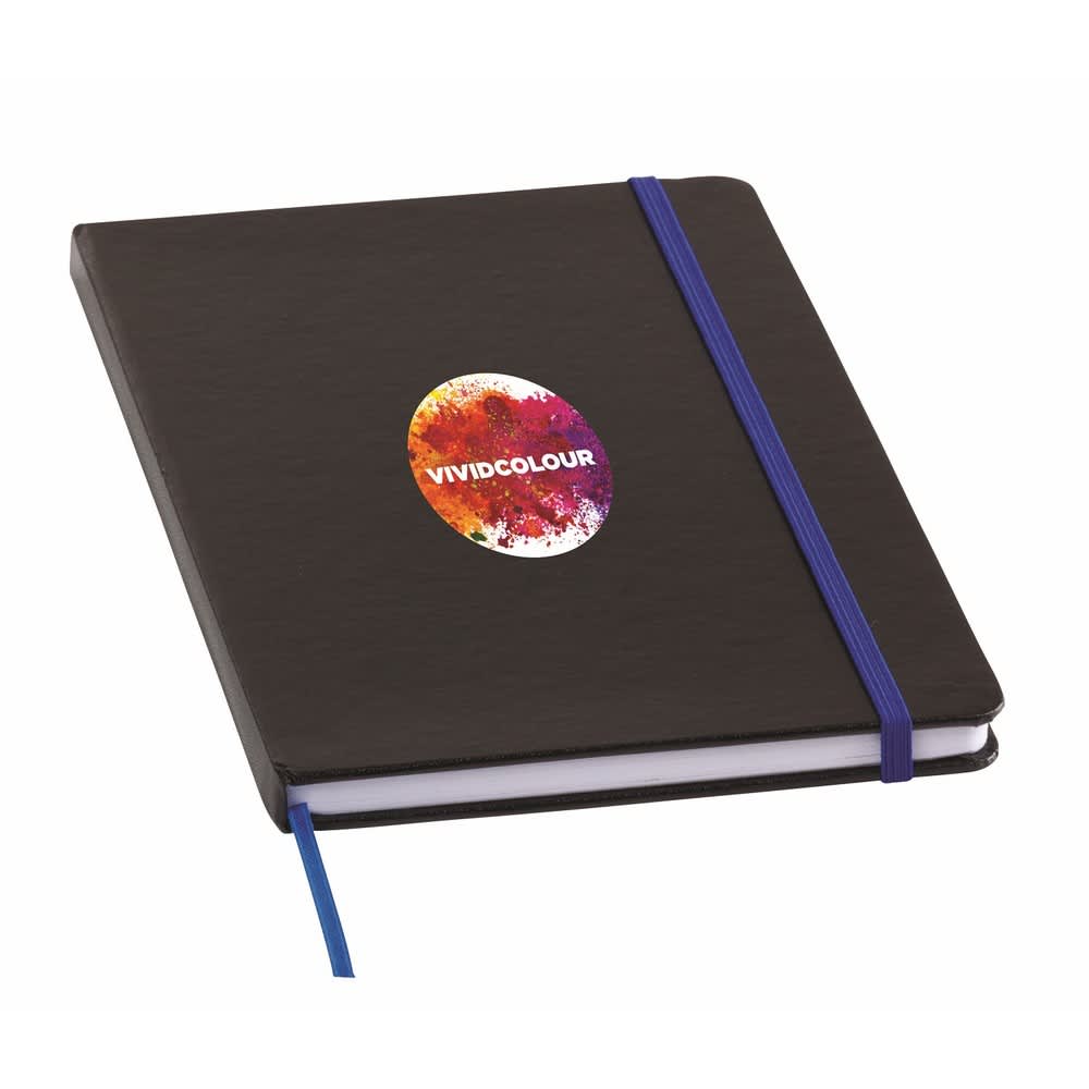 A black Chesterfield notebook with an elastic band and a vibrant sticker, featuring a ribbon bookmark.