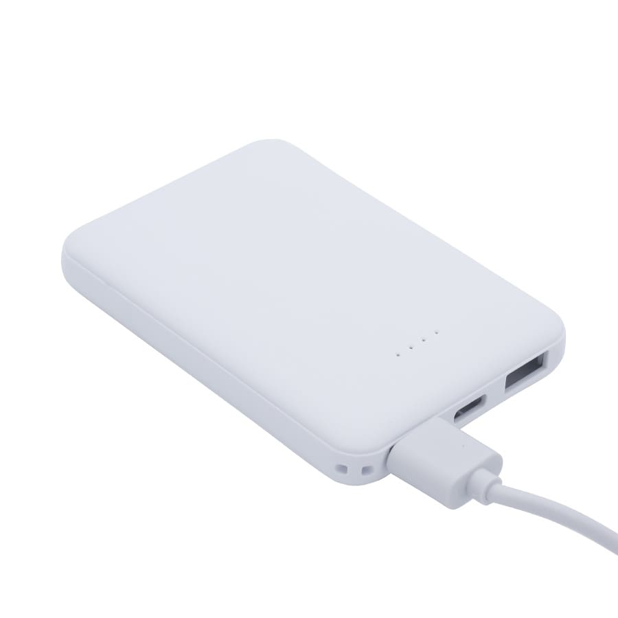 A white power bank with two ports and LED indicators, connected to a charging cable.