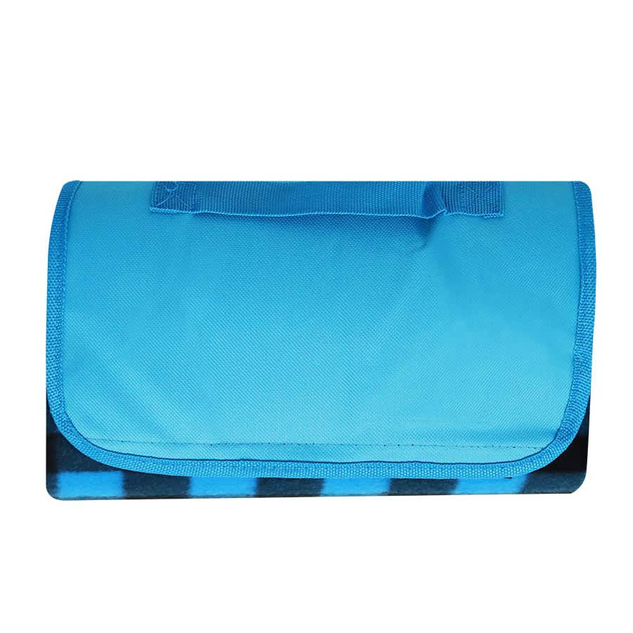 A blue picnic blanket with a foldable design and a handle for easy transport. It features a black and blue patterned underside.