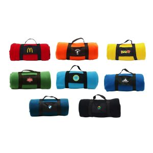A collection of rolled-up blankets in various colours including red, orange, green, blue, and yellow, featuring different logos.