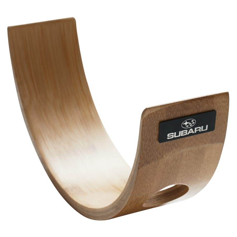 A wooden crescent-shaped wine holder with a logo, exuding a natural finish and sleek design.
