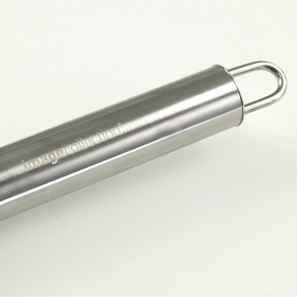A stainless steel BBQ tool with a looped handle, featuring a subtle logo on its surface.