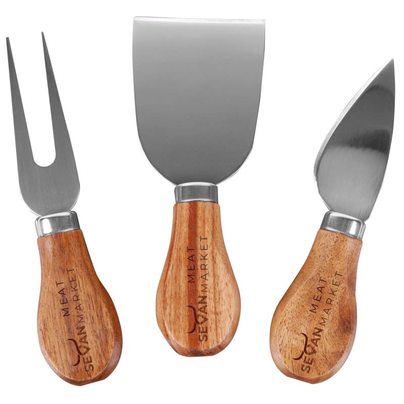 A set of three cheese knives with wooden handles and stainless steel blades, featuring a logo on the handles.