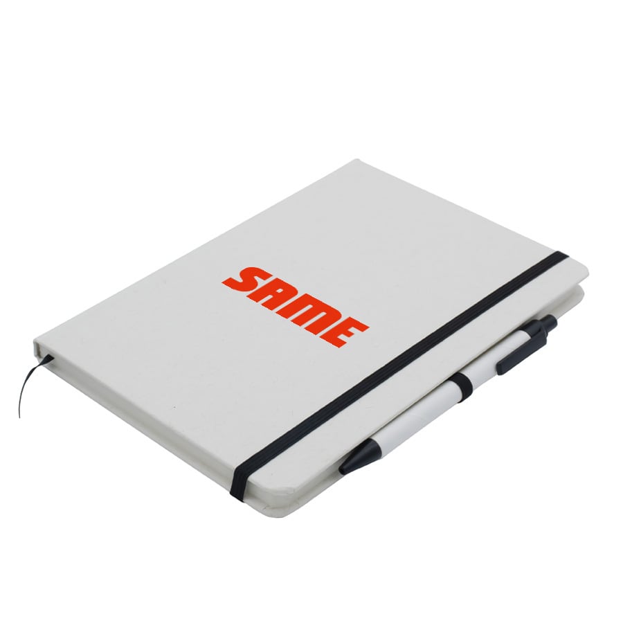 A white A5 notebook featuring an elastic band and a black pen attached. The notebook has a logo on the cover.
