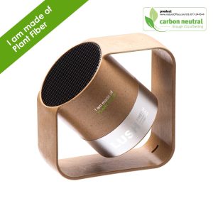 A wireless speaker with a cylindrical design in natural wood tones and a square base, featuring a logo.