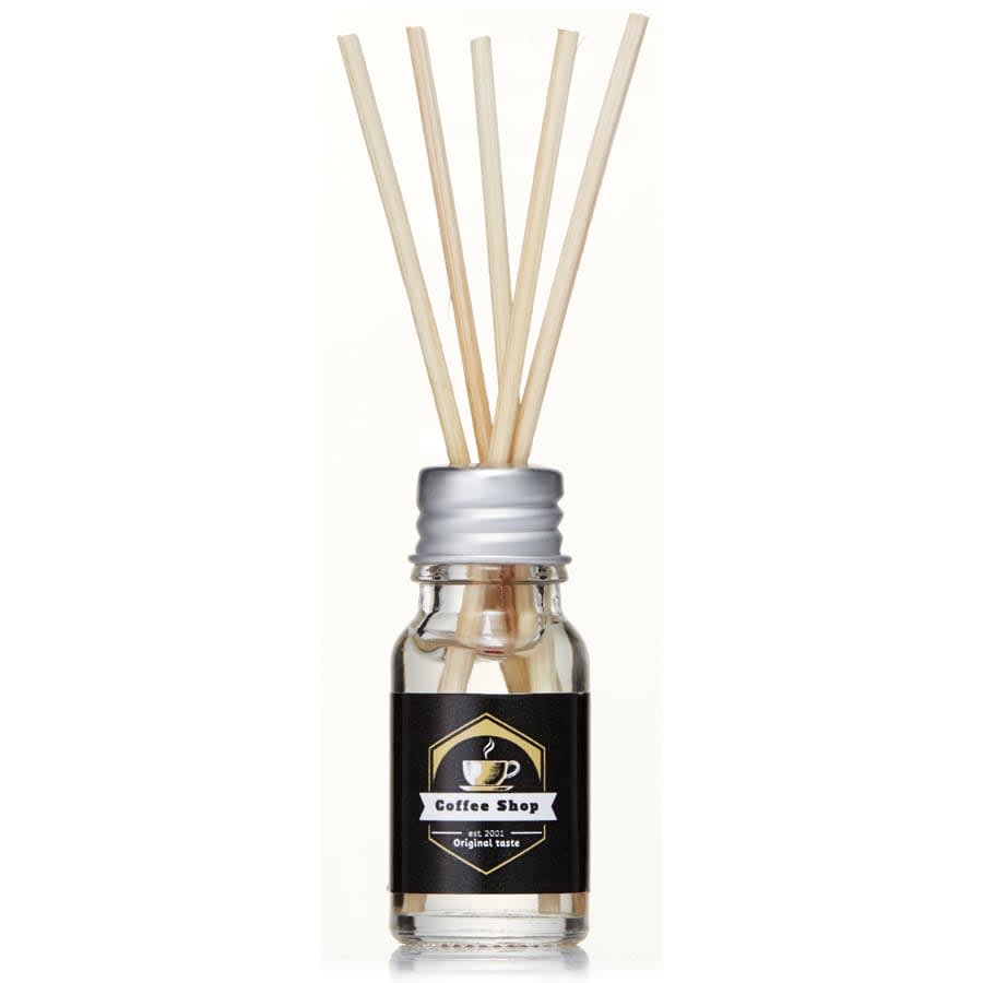 A 10ml clear glass reed diffuser with wooden reeds and a black and gold logo label.