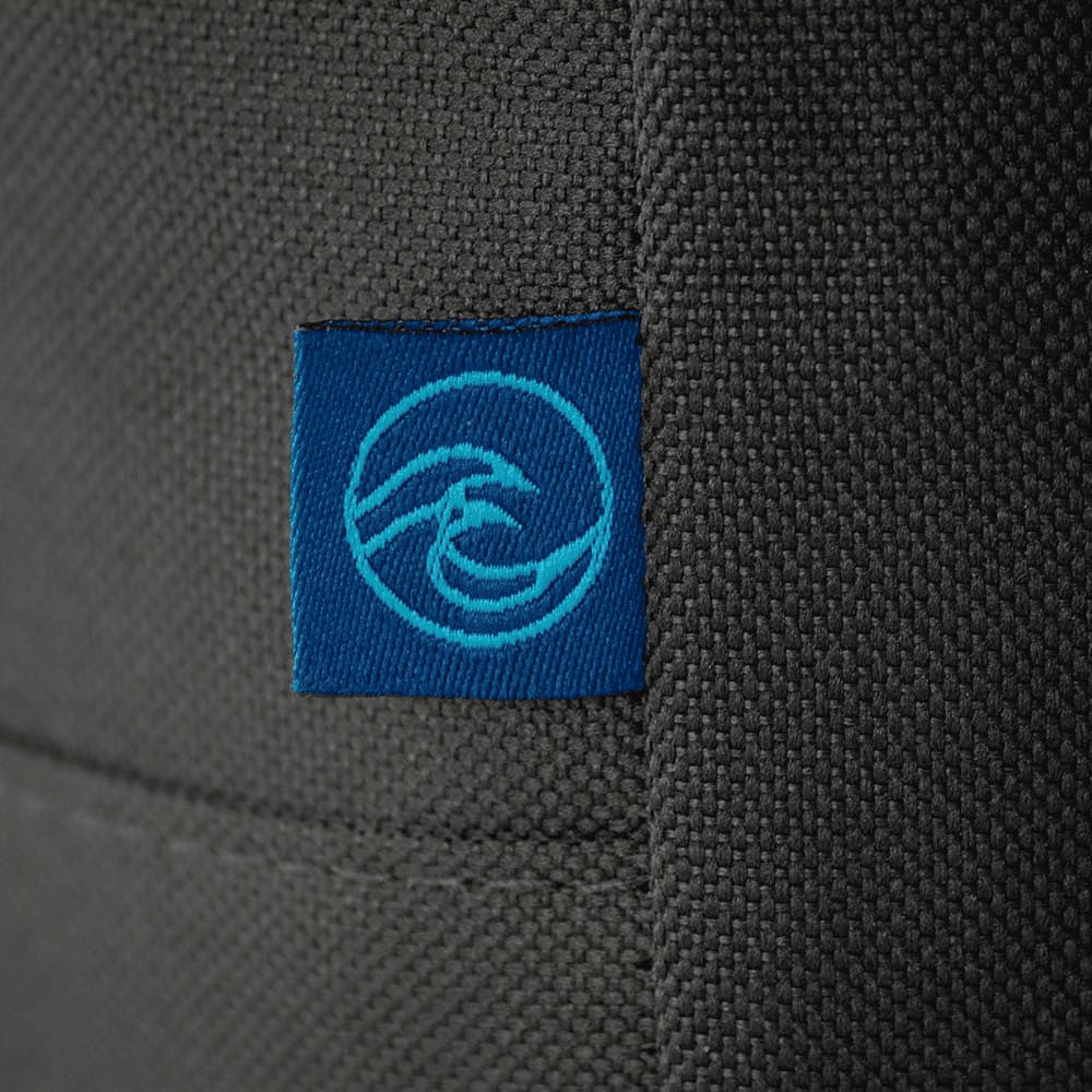 A grey cooler bag featuring a blue logo. The material appears sturdy and textured.