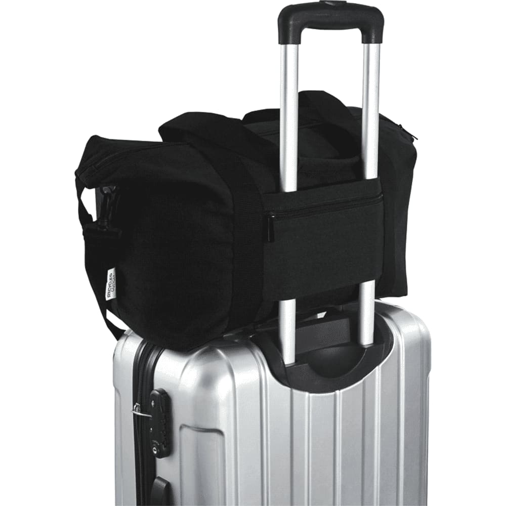 A black recycled canvas sports bag with a shoulder strap and a small tag.