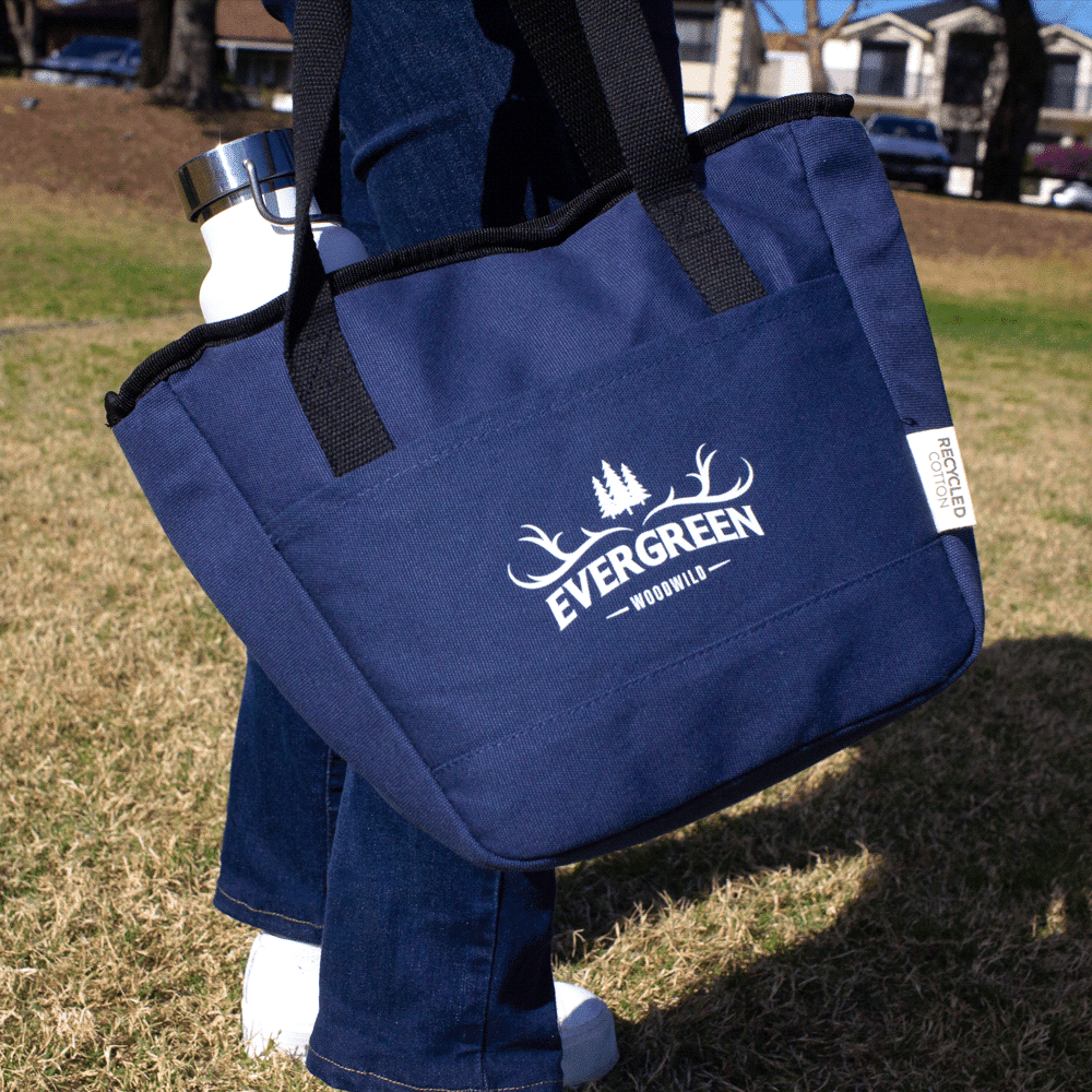 A black cooler tote bag with sturdy handles and an external pocket, made from recycled canvas material.