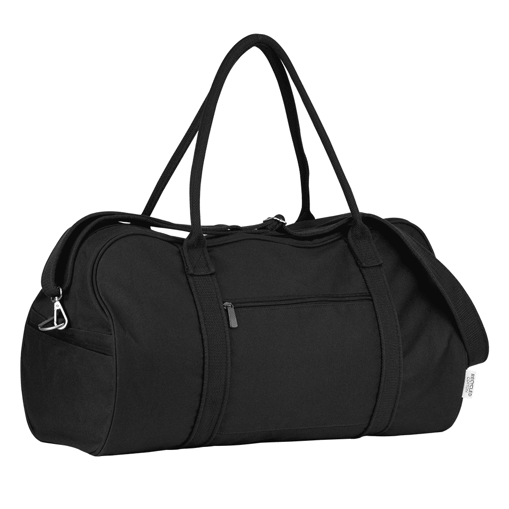A black duffel bag rests on a light blue couch, featuring a zipper pocket and a tag.
