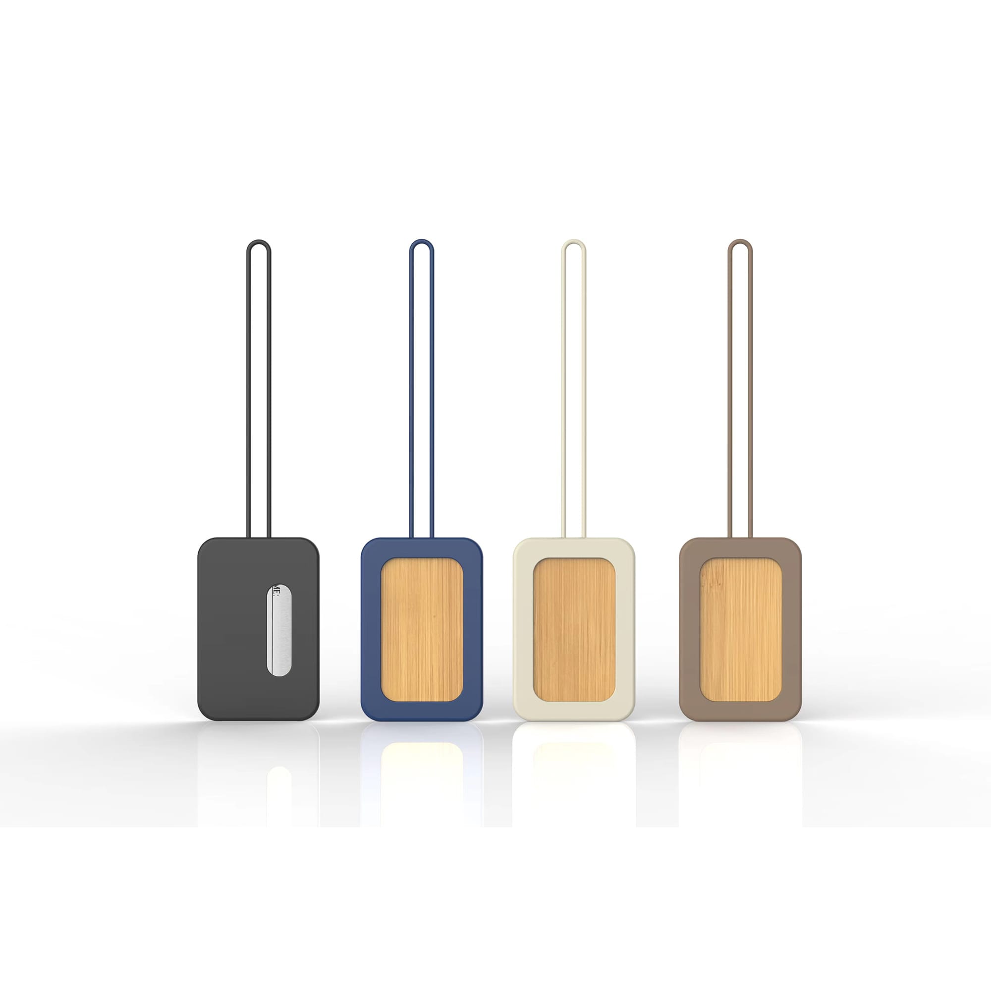 A set of four luggage tags in black, navy, cream, and brown with a wooden panel and built-in loops. Each tag has a logo.