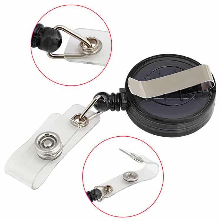 A black retractable ID card holder lanyard with a metal clip and clear strap for securing badges. It features a logo.