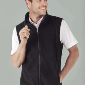 A black micro fleece vest featuring a zip front and stand collar, modelled by a male model in a white shirt.