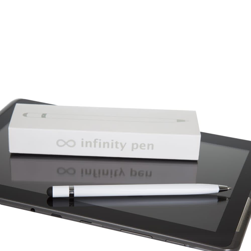 A white metal pen lies next to a tablet on a black surface, with a white box labelled 