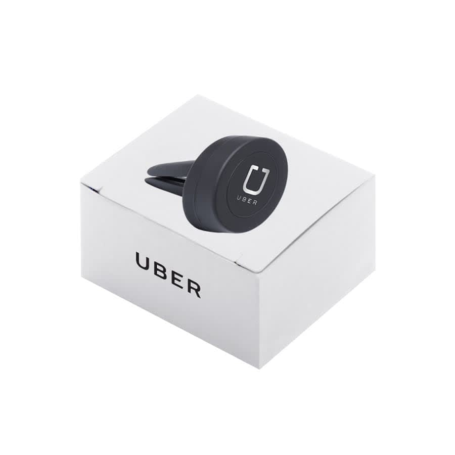 A black universal magnetic car mount displayed on a white box with a logo.
