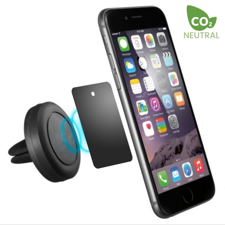 A black round car phone holder next to a smartphone with a screen displaying apps. The holder has a logo.