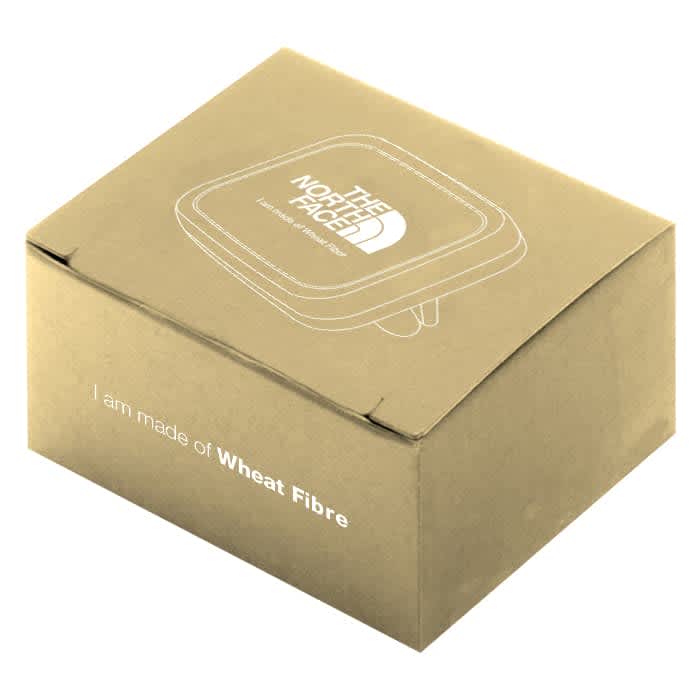 A rectangular box made of wheat fibre, featuring a logo and a light brown, textured surface.