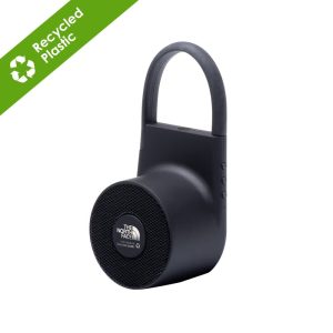 A black wireless outdoor speaker made from recycled ABS, featuring a handle and buttons on the side.