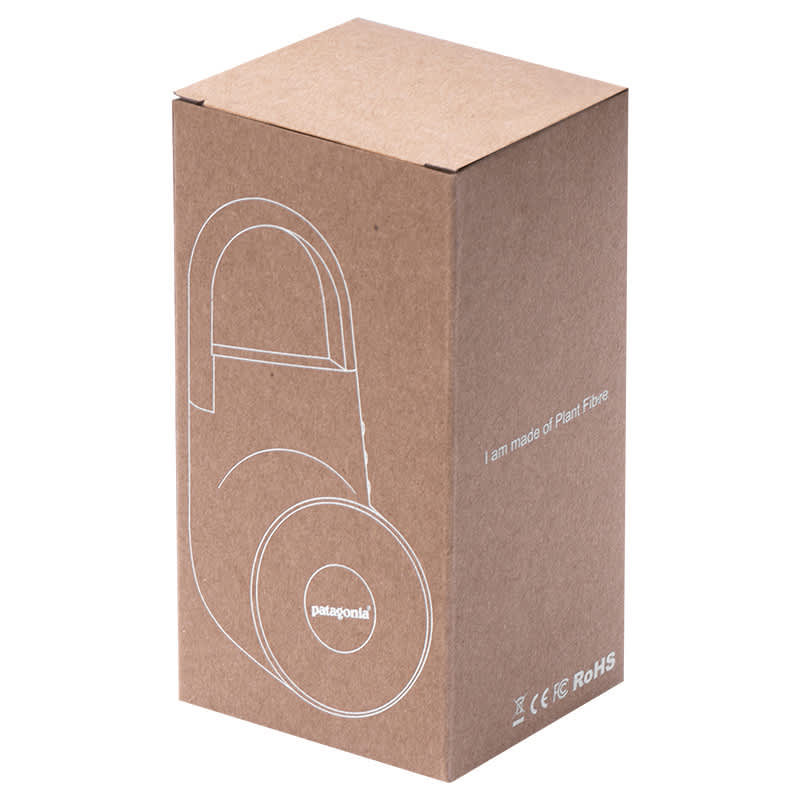 A brown cardboard box containing a Tuba Wireless outdoor speaker made of plant fibre, featuring a logo.
