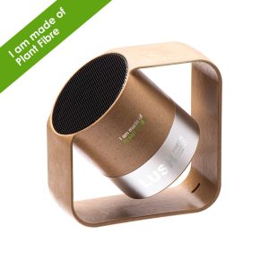 A wireless speaker made of plant fibre and aluminium, featuring a circular speaker mounted in a square frame.