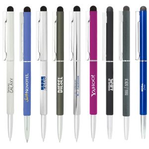 A collection of slim metal ballpoint pens in various colours, featuring stylus tips and logos on some pens.
