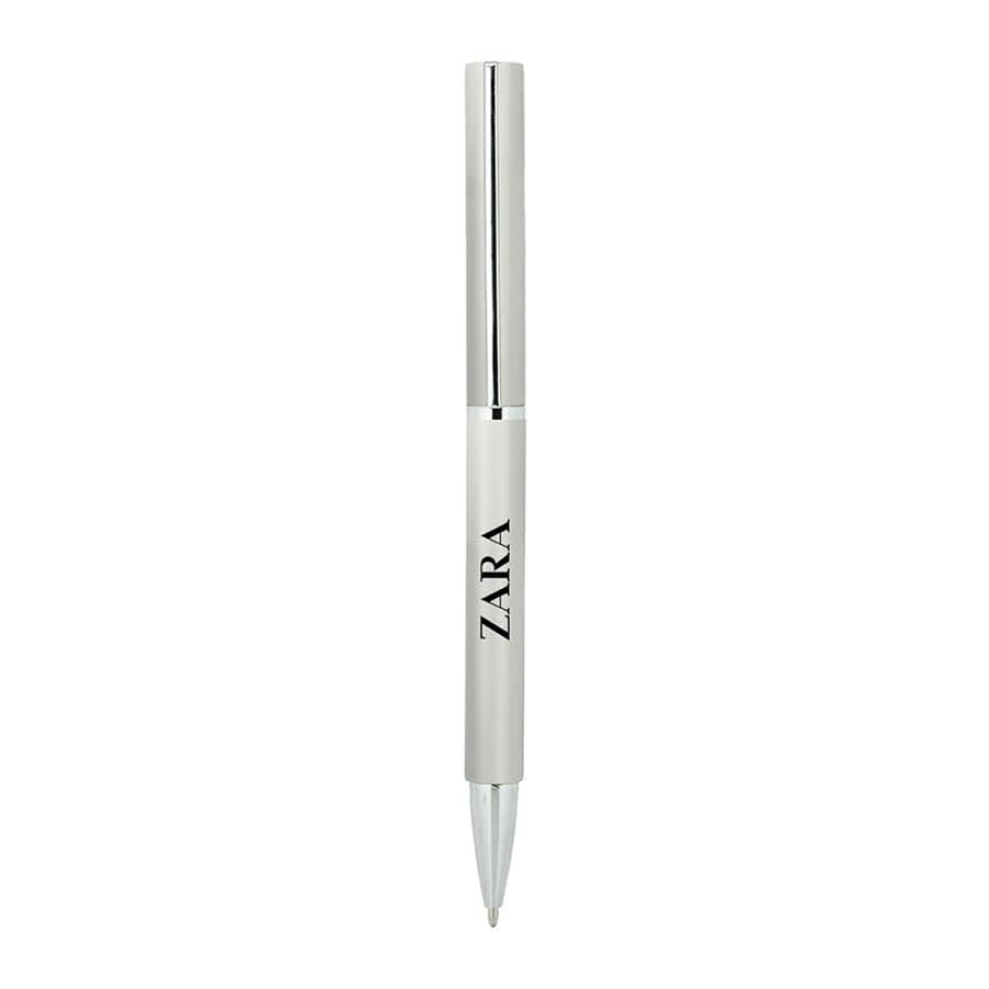 A white metal ballpoint pen with a shiny silver clip and branding on the barrel.