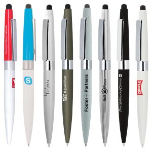 A collection of metal ballpoint pens in various colours, featuring stylus tips and branded logos.
