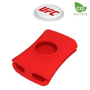 A red cable management tool with two slots, featuring a logo and a round white disc above it.