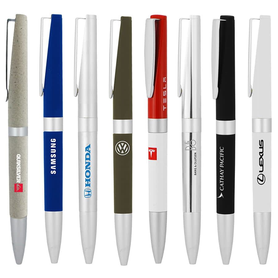 A collection of eight metal ball pens in various colours, featuring logos on some aspects.