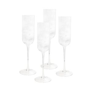 Four clear glass champagne flutes with a ribbed design, featuring tall stems and a polished finish.