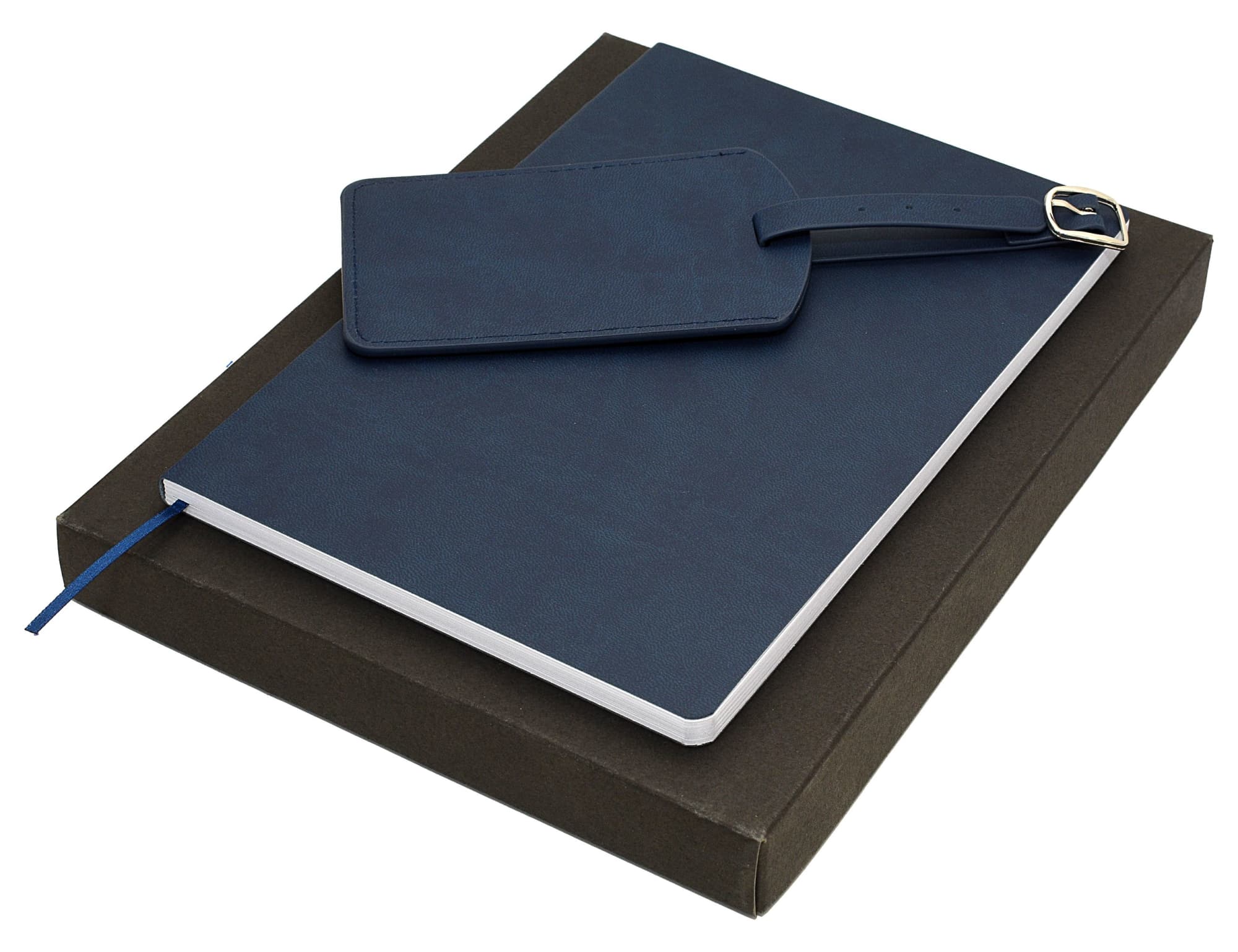 A navy travel journal set with a matching tag, presented in a dark box. Includes a ribbon bookmark and an embossed logo.