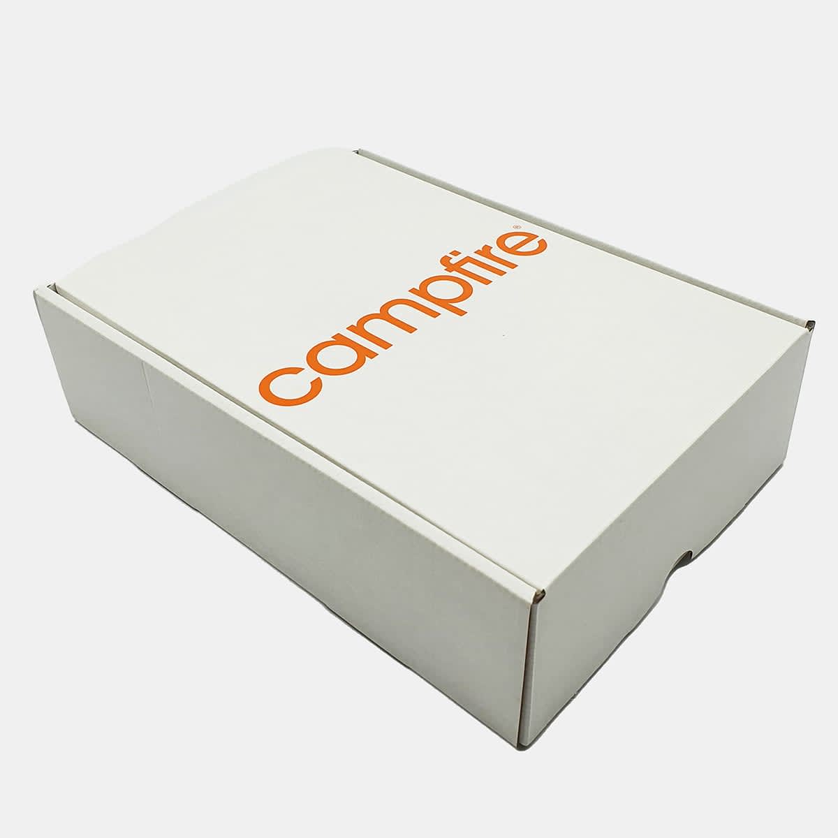 A white box with a prominent orange logo, featuring a simple and clean design.