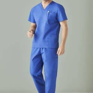 A man wearing a blue unisex scrub top and cargo pants, standing against a neutral background. The outfit includes a pocket.