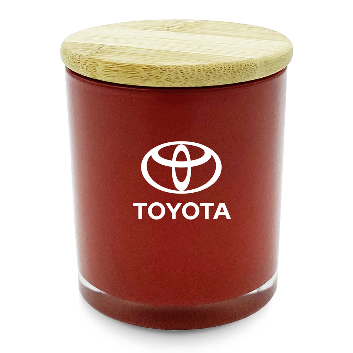 A medium red candle with a bamboo lid and a logo on the front.