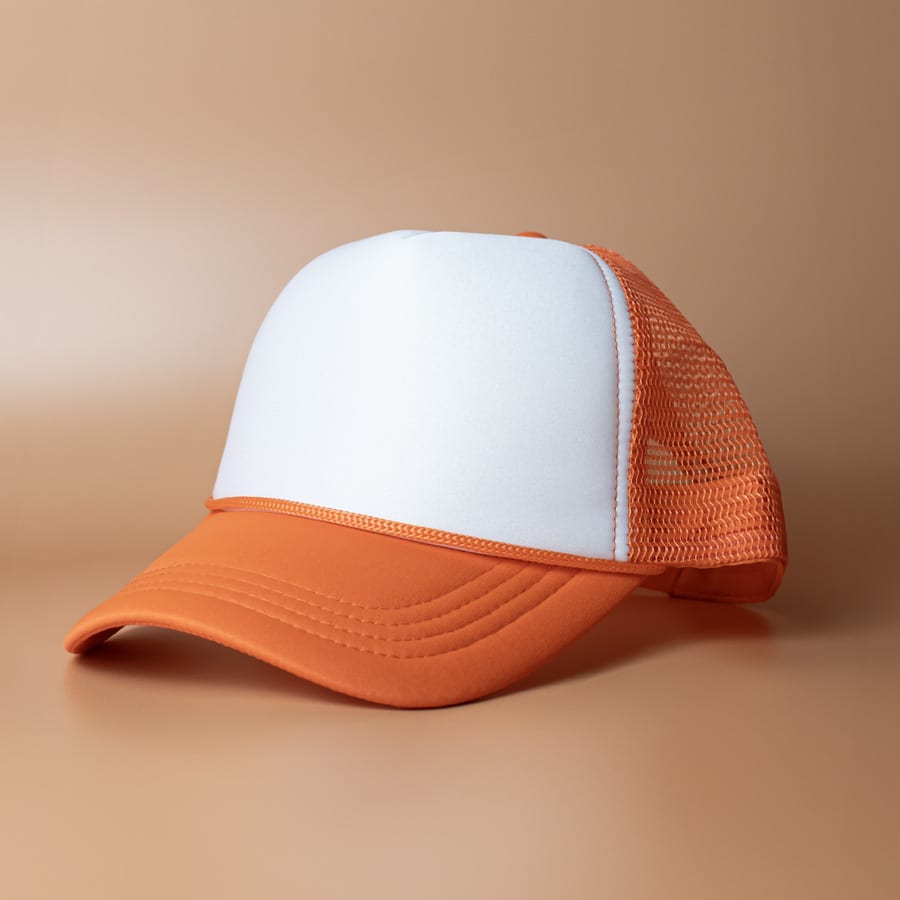 An orange and white trucker cap with a mesh back and an adjustable strap, featuring a logo on the front.