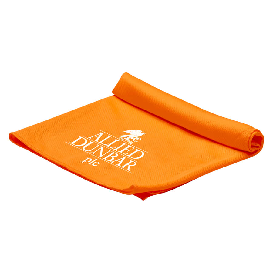 An orange cooling towel, neatly rolled, featuring a logo. Ideal for leisure and outdoor activities.