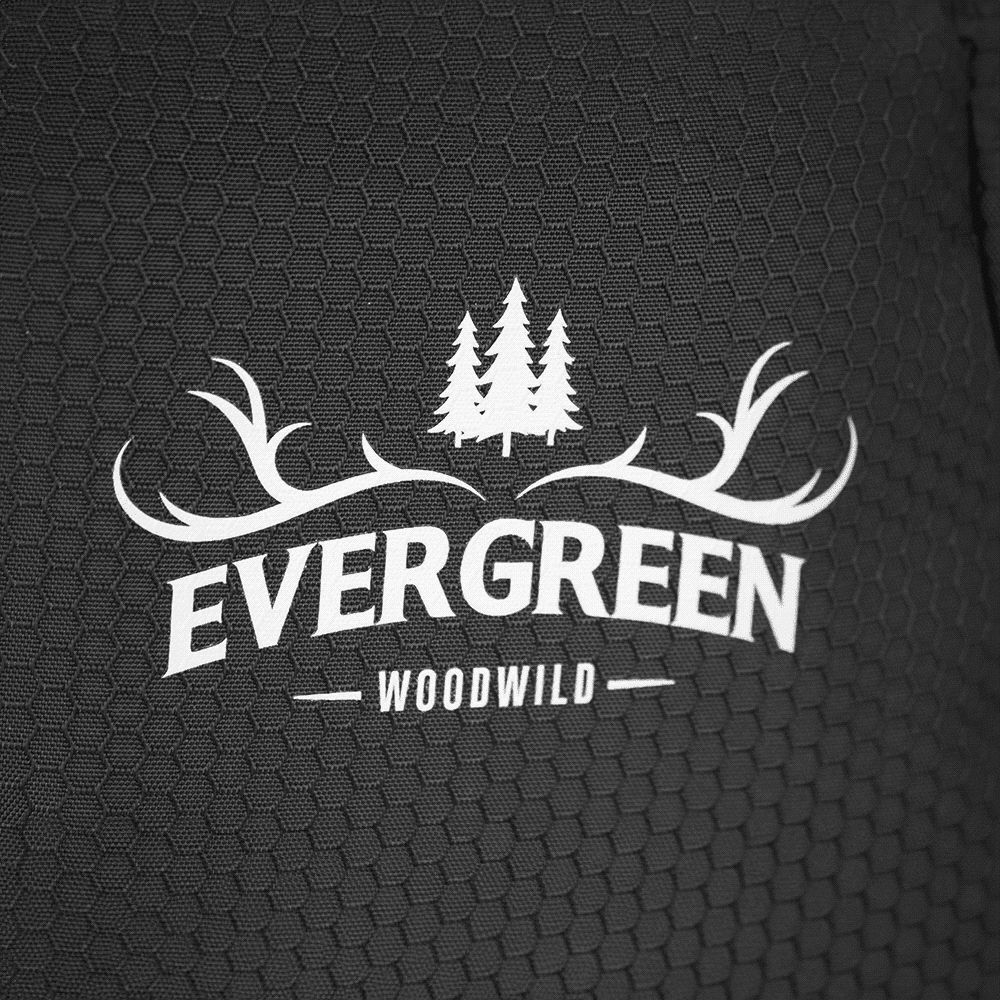 A textured, black fabric displaying a logo with trees and antlers, featuring the words 