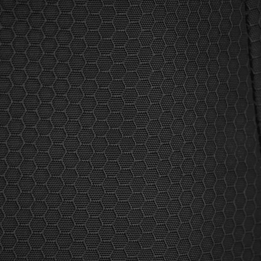 A textured black fabric featuring a hexagonal pattern, suitable for backpacks and similar items.