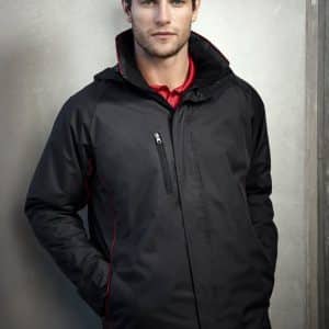 A man wearing a black unisex jacket with red accents and a zippered pocket, featuring a logo.