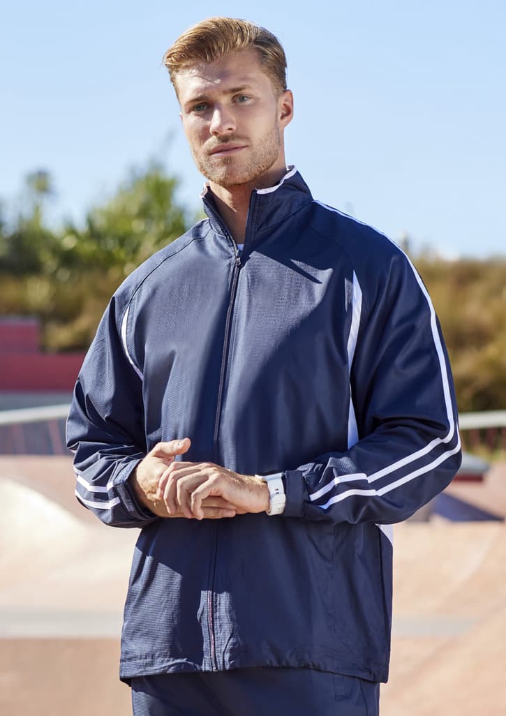 A unisex navy track jacket features white stripes and a zip-up front, with a logo on the chest.