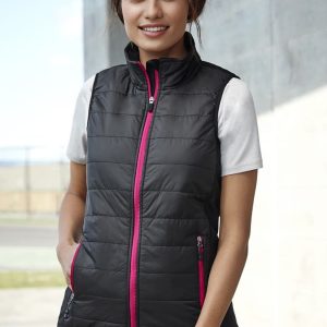 A black women's vest with pink zippers and pockets, featuring a quilted design and a high collar.