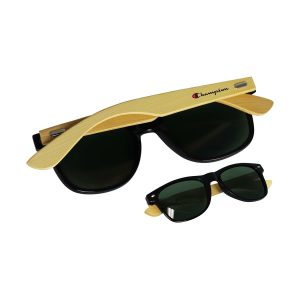 Bamboo frame sunglasses with black lenses, featuring a logo. Another smaller pair in the foreground.