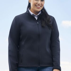 A black soft shell jacket with a zip front, worn by a woman outdoors against a scenic backdrop.