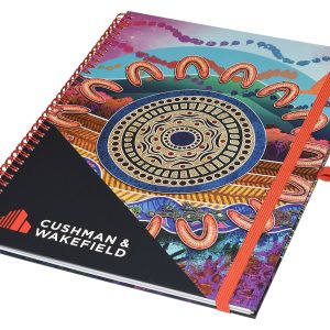 A colourful A4 side-bound notebook featuring a spiral binding and an elastic closure, with a logo on the cover.
