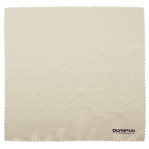A large beige microfibre cleaning cloth with a scalloped edge and a logo in one corner.