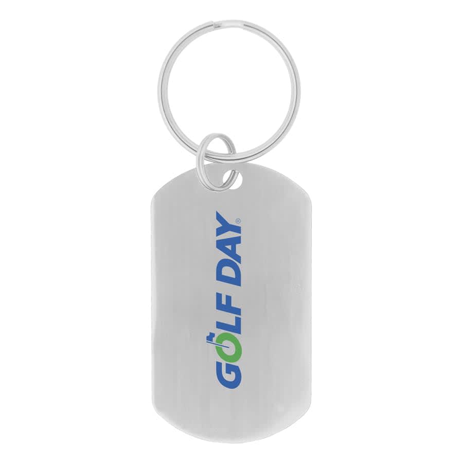 A silver dog tag keychain featuring a logo in blue and green colours. It has a metal ring for attachment.