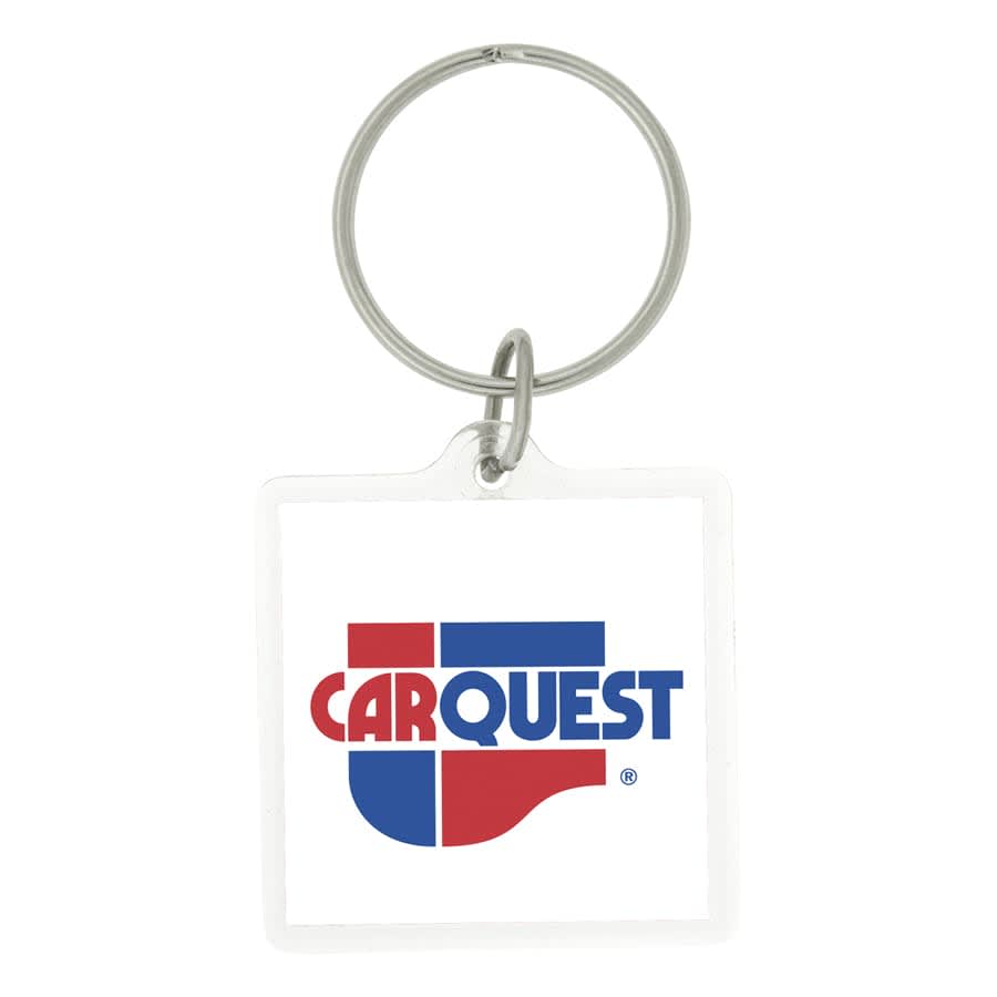A square acrylic keychain in red, attached to a silver keyring. It features a plain surface with a logo.