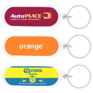 An oval acrylic keychain in blue, held by a hand, featuring a logo and an Australian Made badge.
