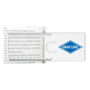 A transparent magnifier ruler with a blue logo, displaying text from a book and measurement markings.